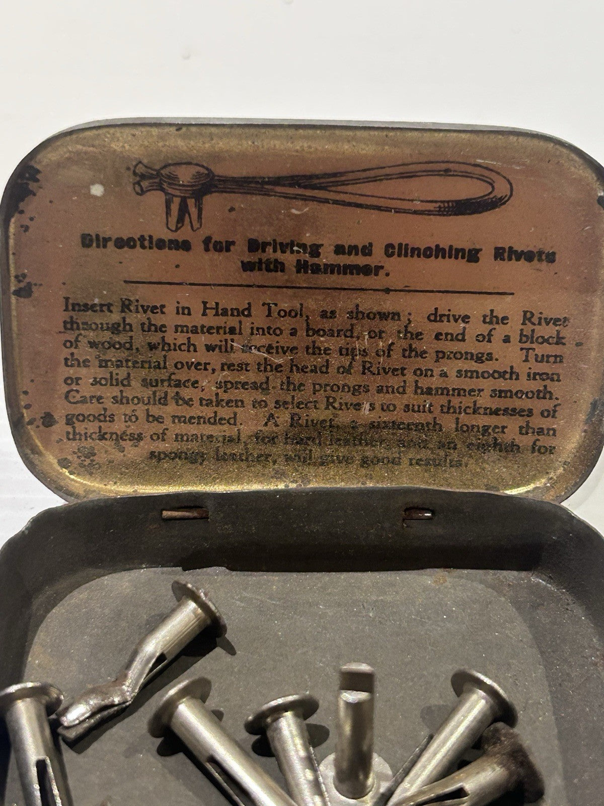 Bifurcated rivets vintage tin classic collectable.