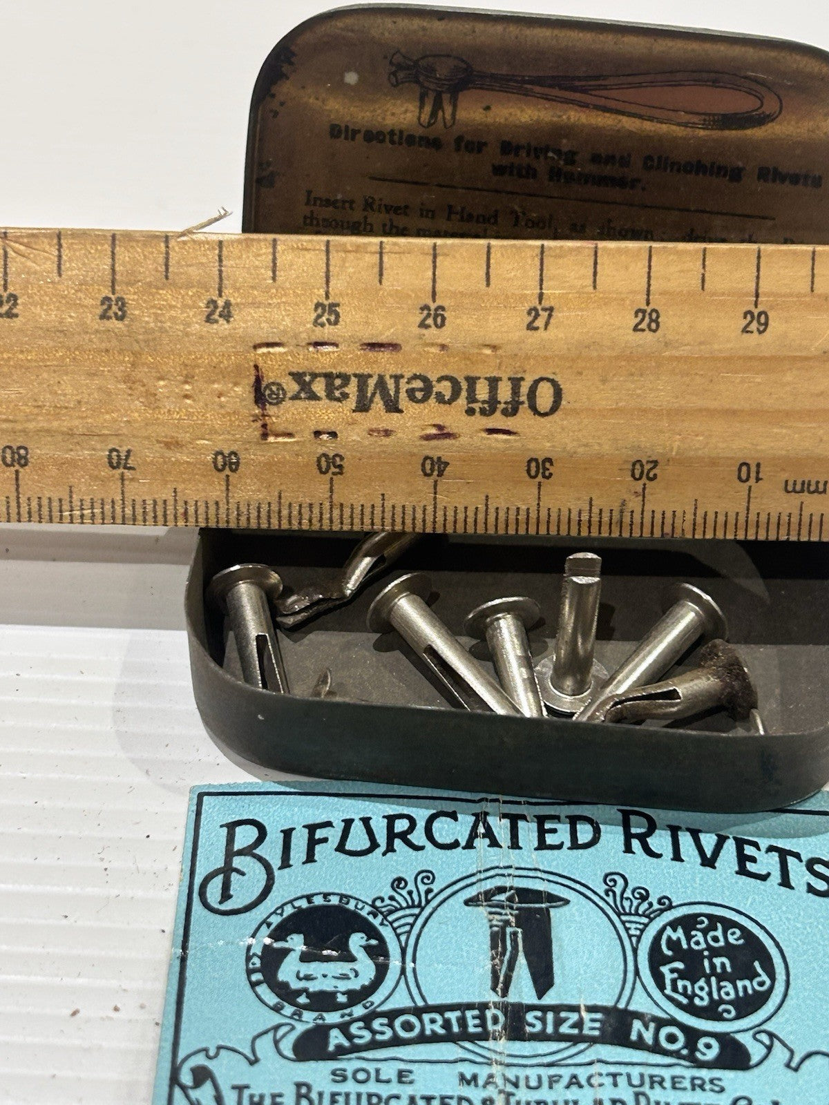 Bifurcated rivets vintage tin classic collectable.
