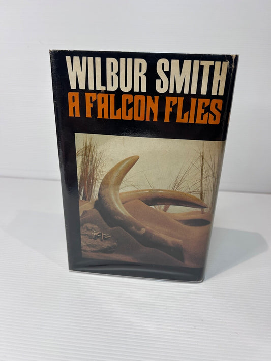 Wilbur Smith A Falcon Flies 1980 HC DJ Book Club Ed African Adventure Novel 523p