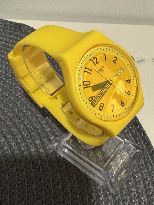Swatch SUOJ702 Sunlight Yellow Rainbow Strap Swiss Watch Day Date Working