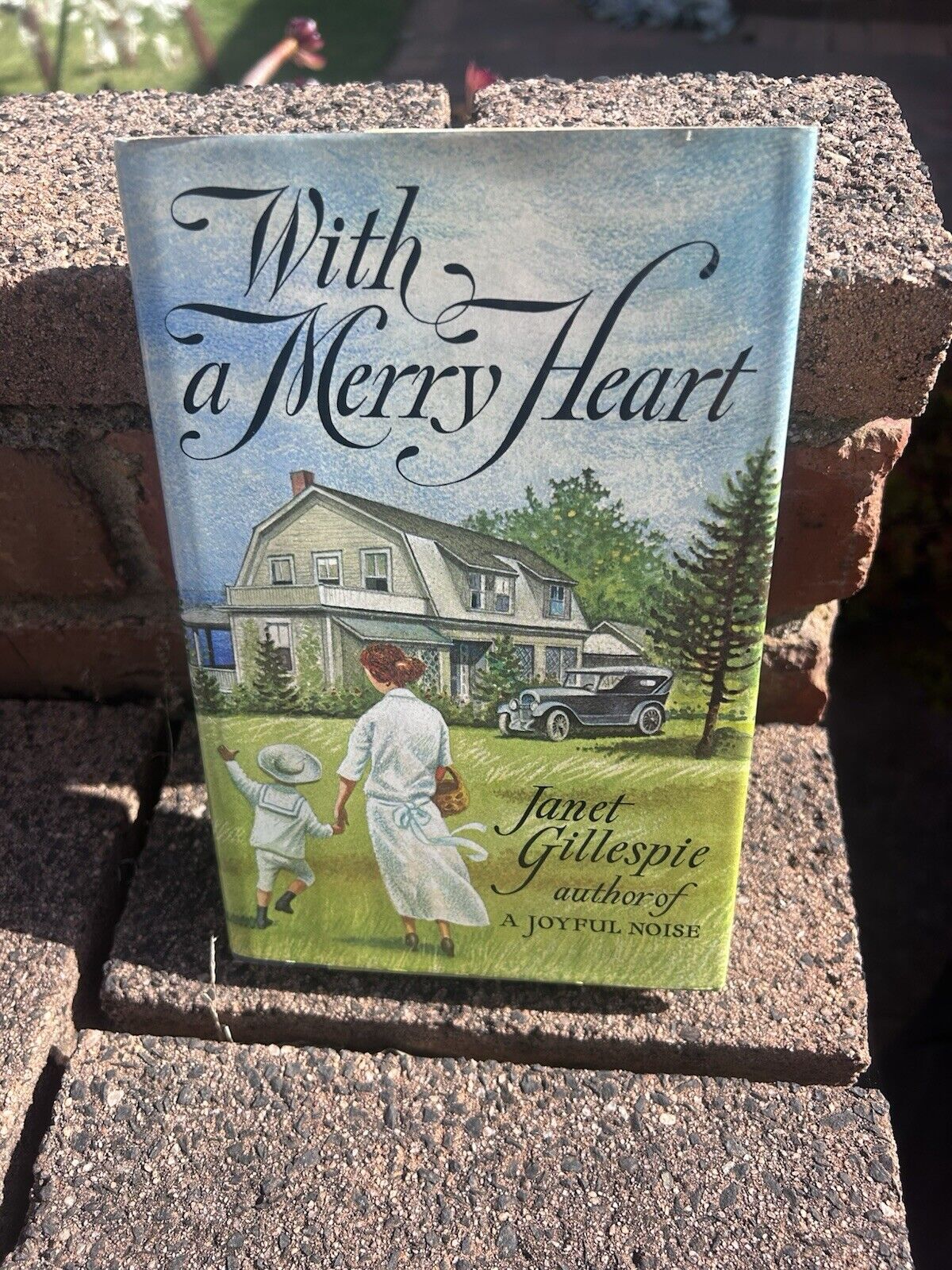 With A Merry Heart by Janet Gillespie First Edition Hard Cover and Dust Jacket