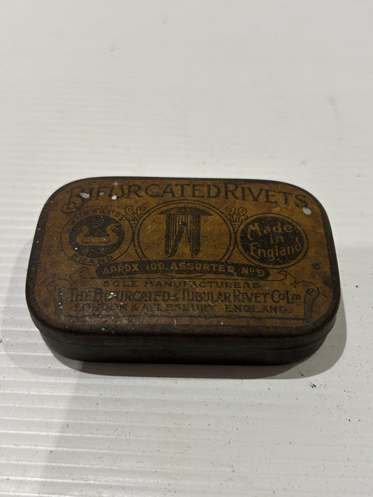 Bifurcated rivets vintage tin classic collectable.